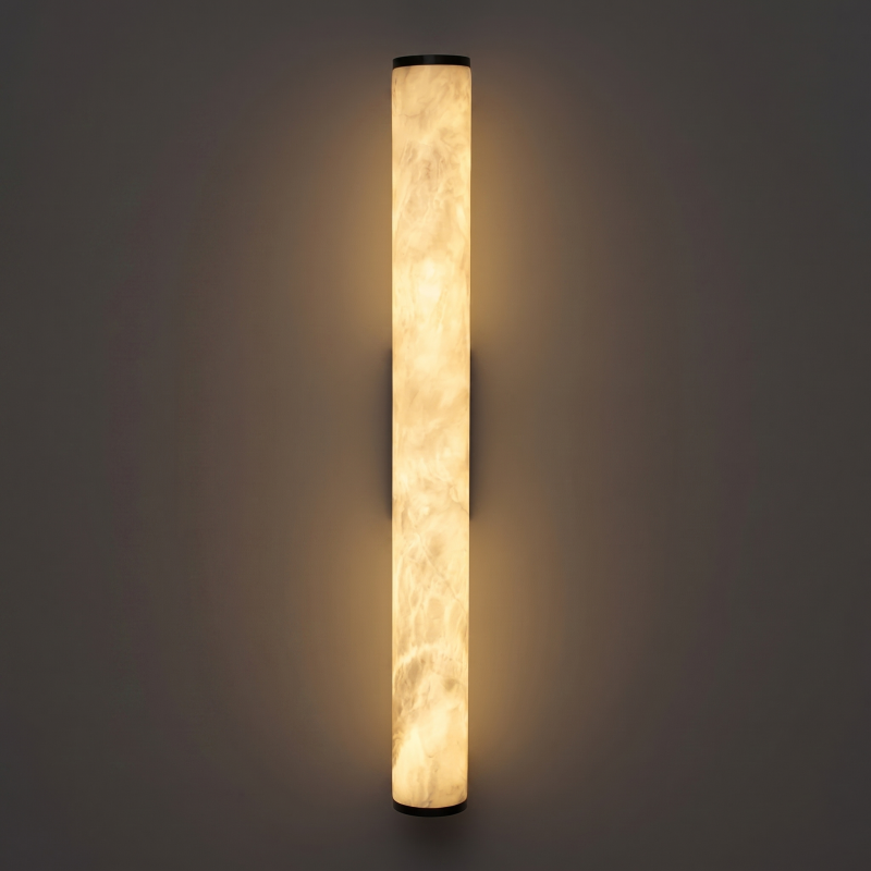 Alabaster wall sconce shown with an antique brass finish.