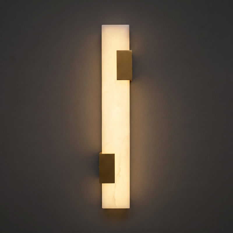 Alabaster wall sconce shown with a matte black finish.