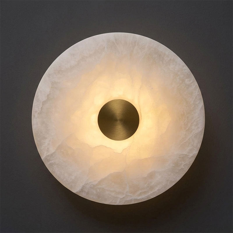Alabaster sconce shown in a modern Mediterranean style interior.