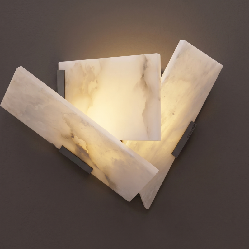 Alabaster wall sconce with a bronze finish.