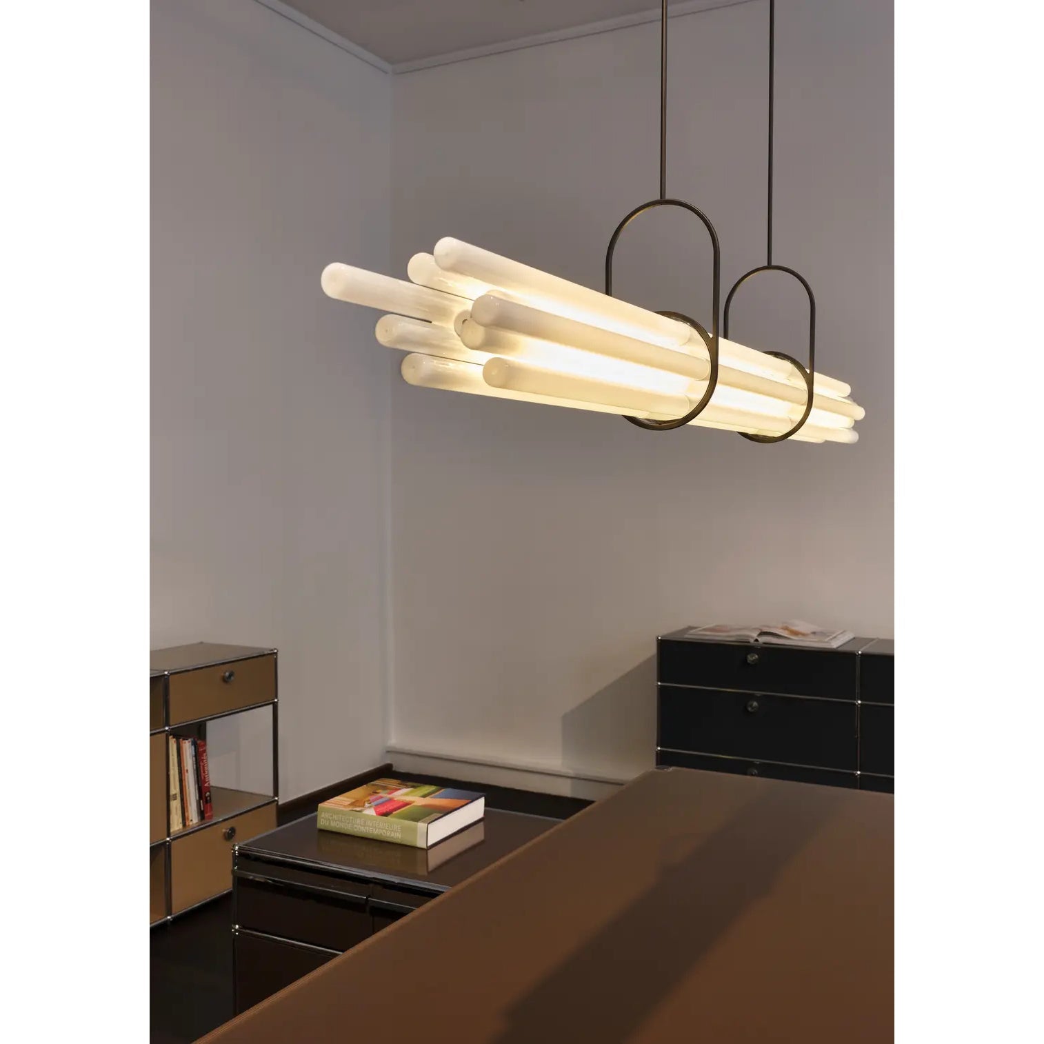 The NL 12 chandelier in a black finish, adding a majestic touch to an interior.
