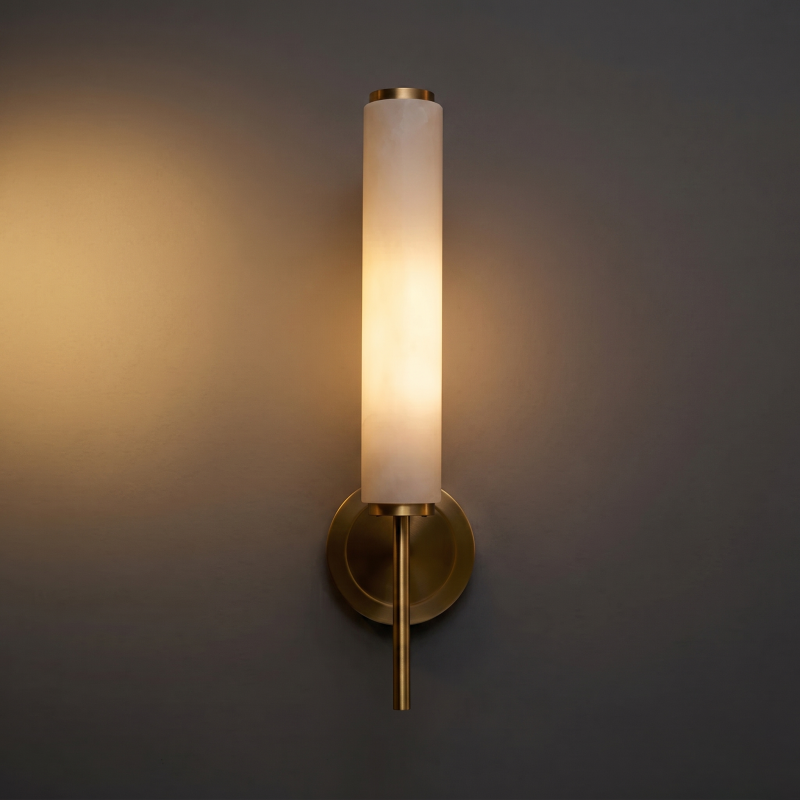 Application shot of an alabaster sconce in a stairwell.