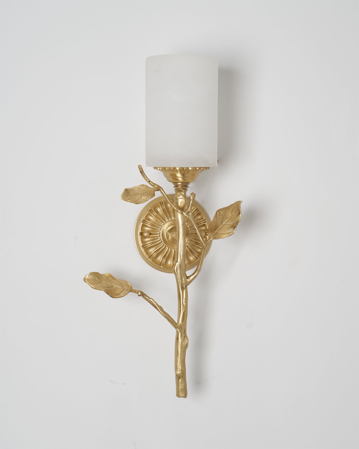 Lifestyle image featuring the Natalia sconce in a modern living room setting.