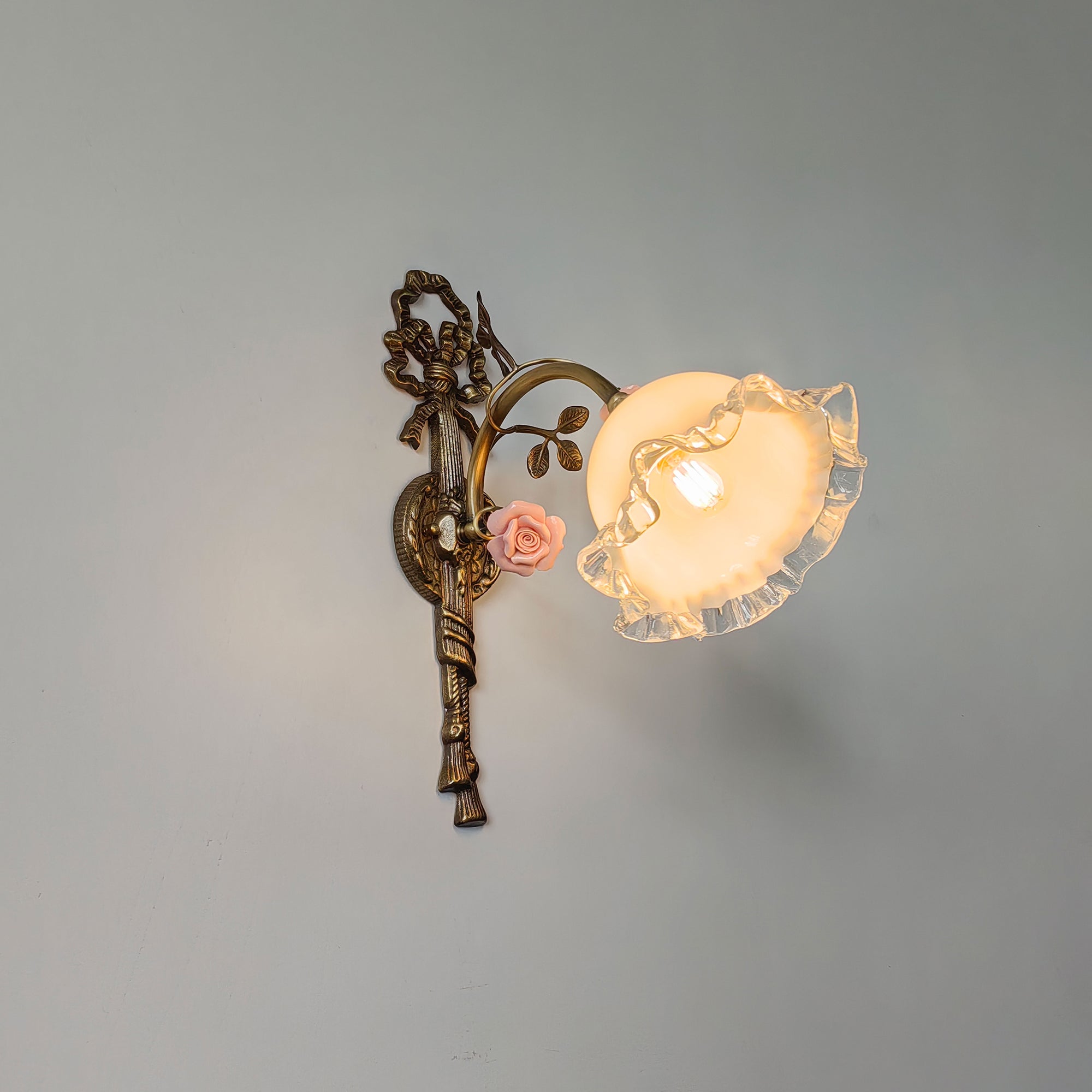 The elegant form of the Neiman Wall Lamp.