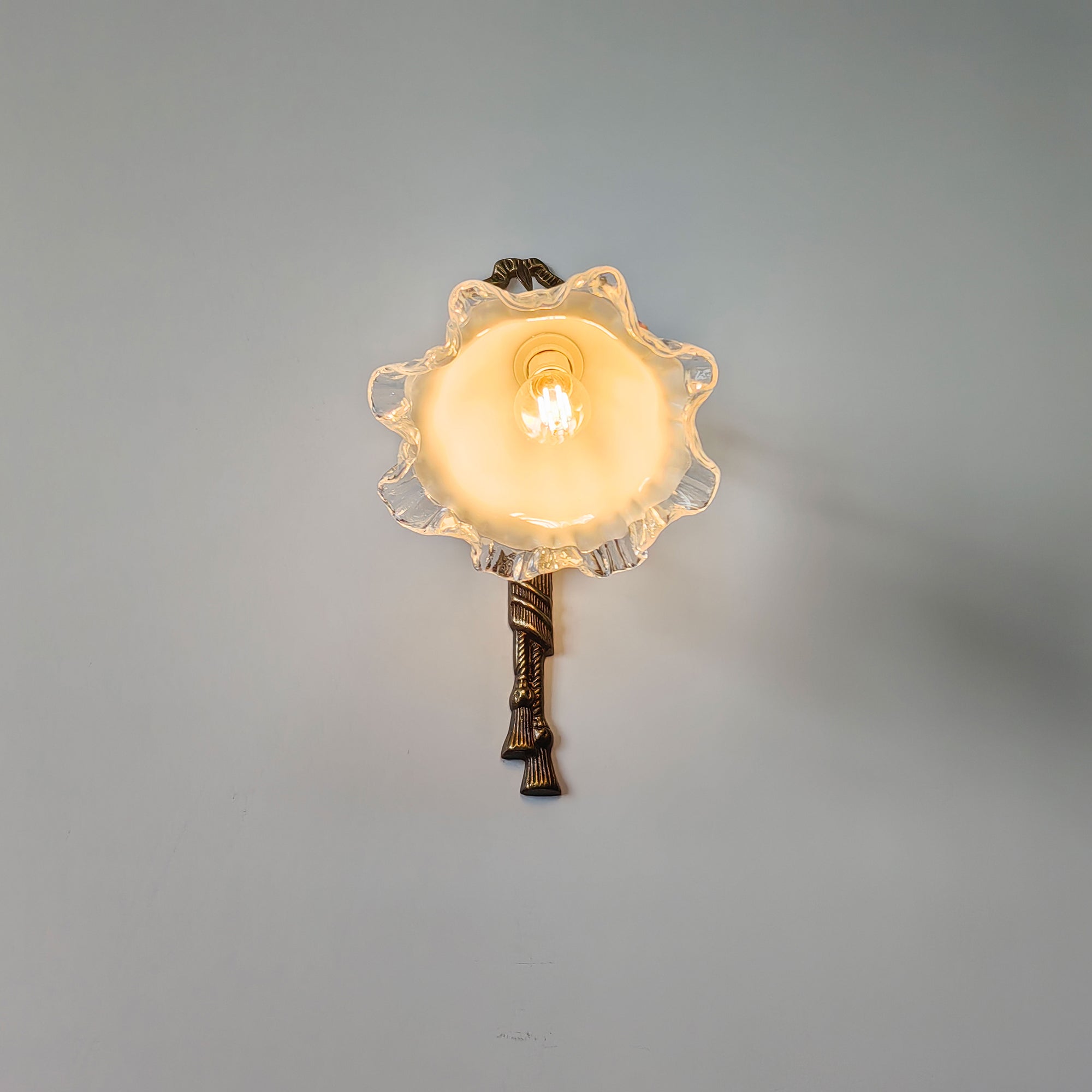 The Neiman Wall Lamp, a blend of form and function.