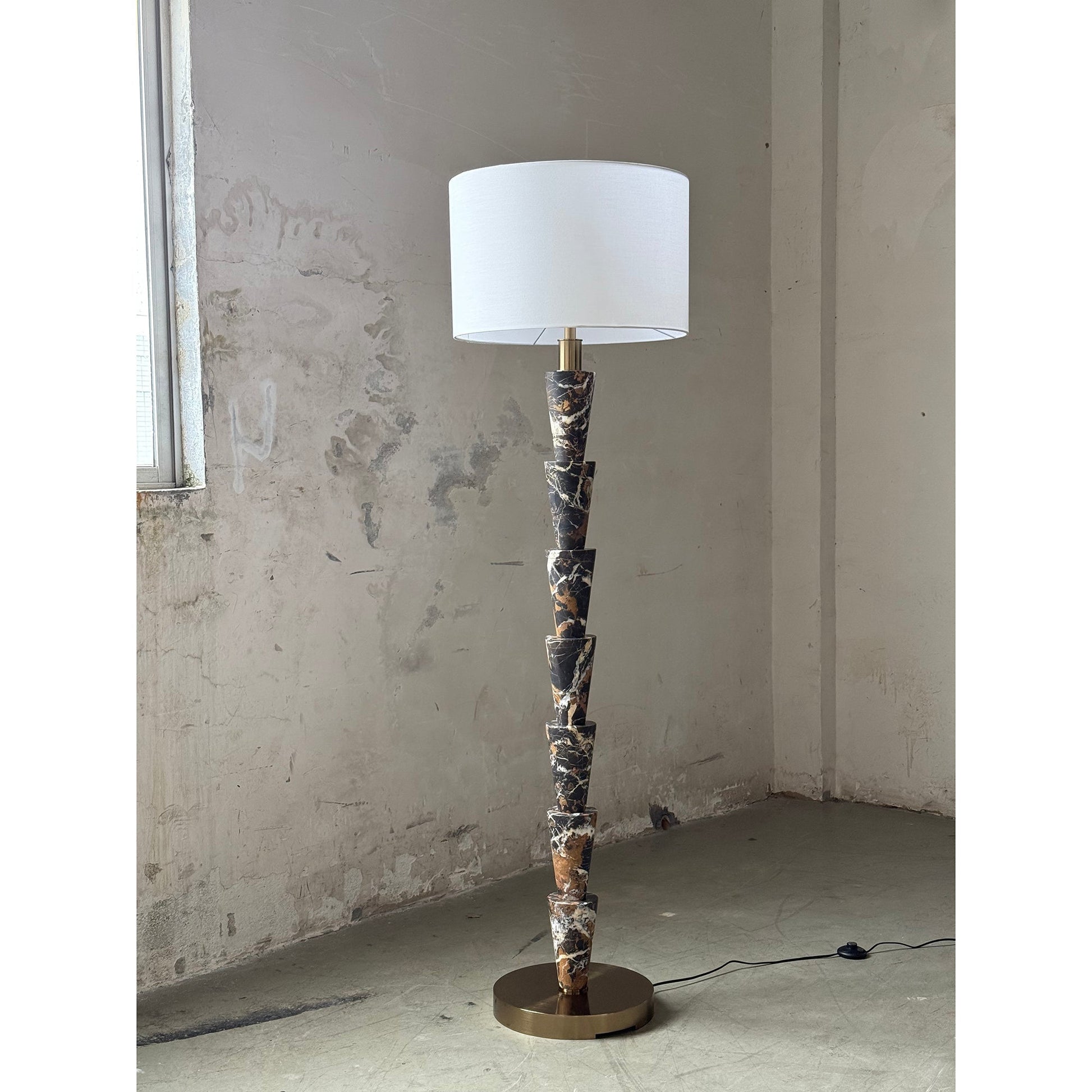 The Nizwa Marble Floor Lamp shown from the side.