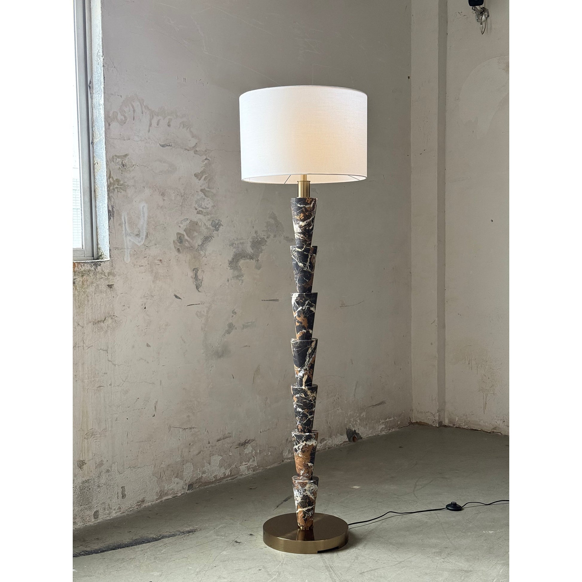 The black marble version of the Nizwa Floor Lamp.