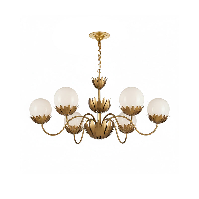 The Noemie Chandelier installed over a dining area.