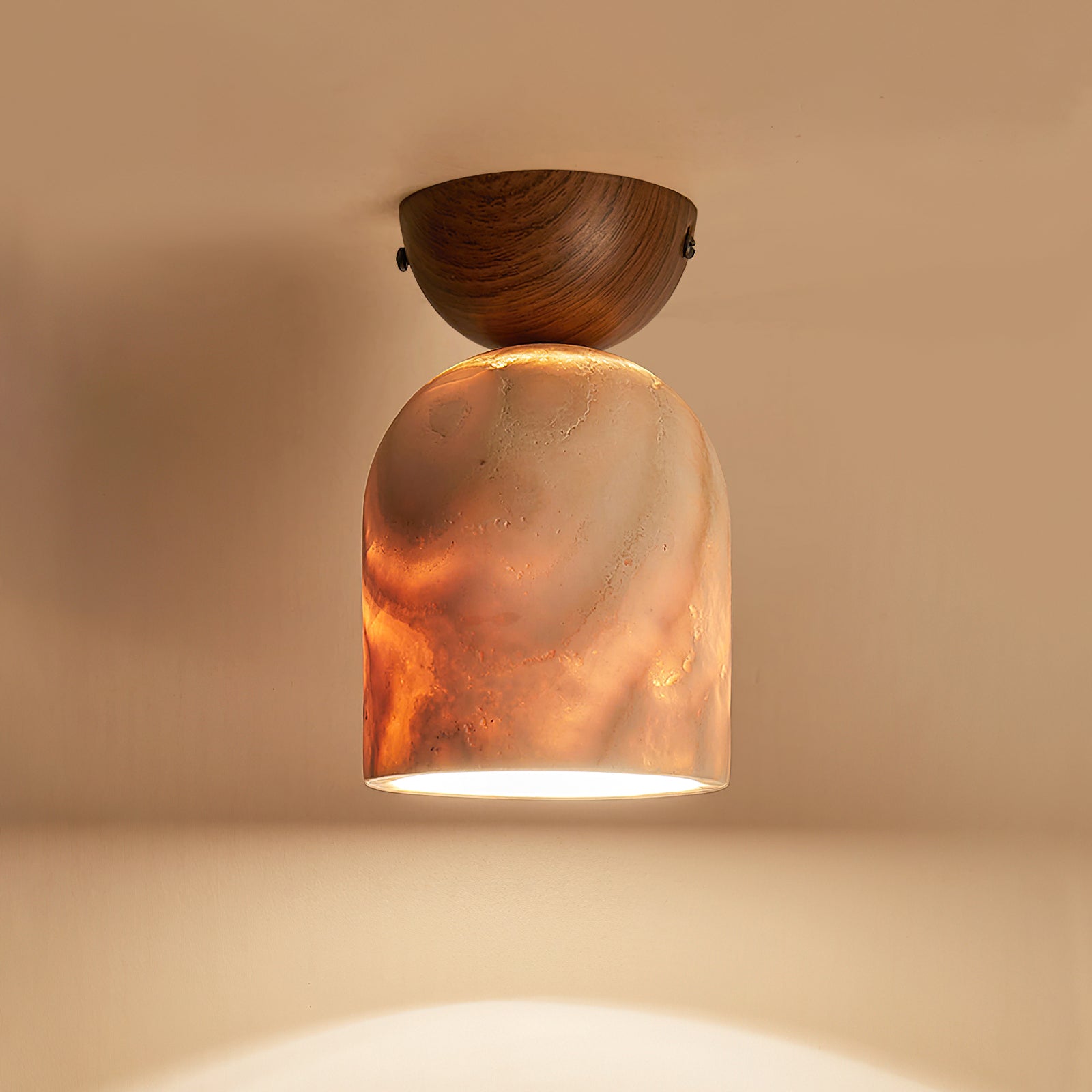 The Noncu Travertine Ceiling Lamp in the natural wood color finish.