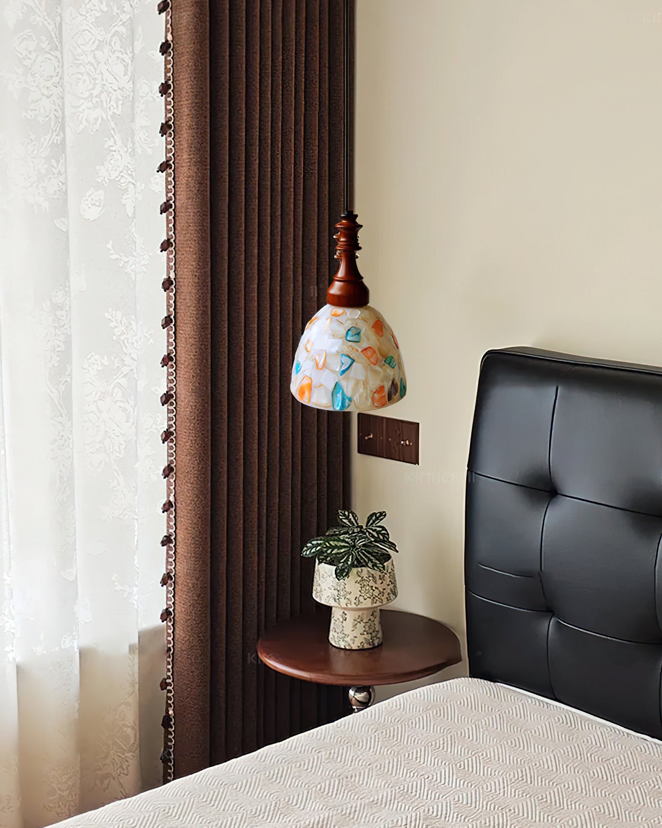 Lifestyle image of the Nonna Pendant Light in a dining room setting.