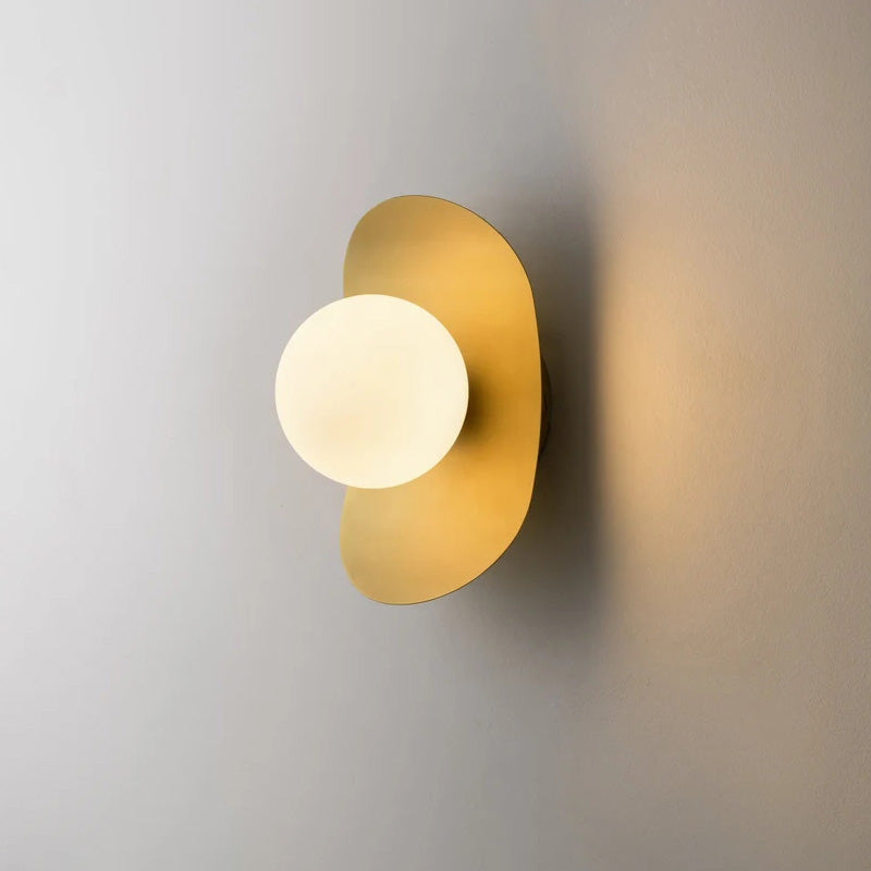 The matte black Nouvel Wall Lamp creating a strong architectural statement.