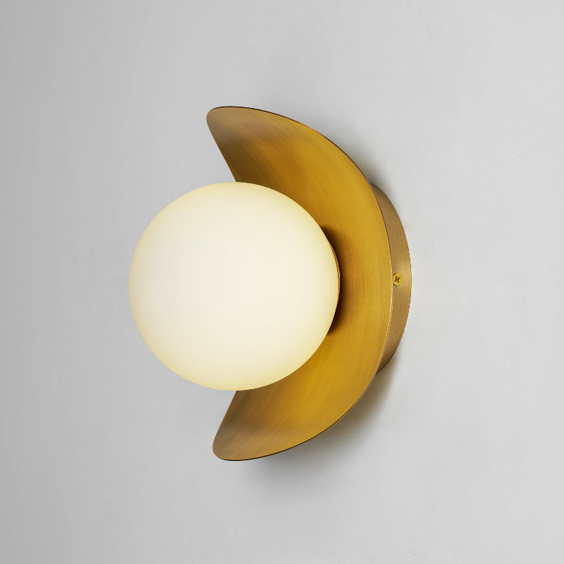 Unlit view of the Nouvel Wall Lamp in antique brass.