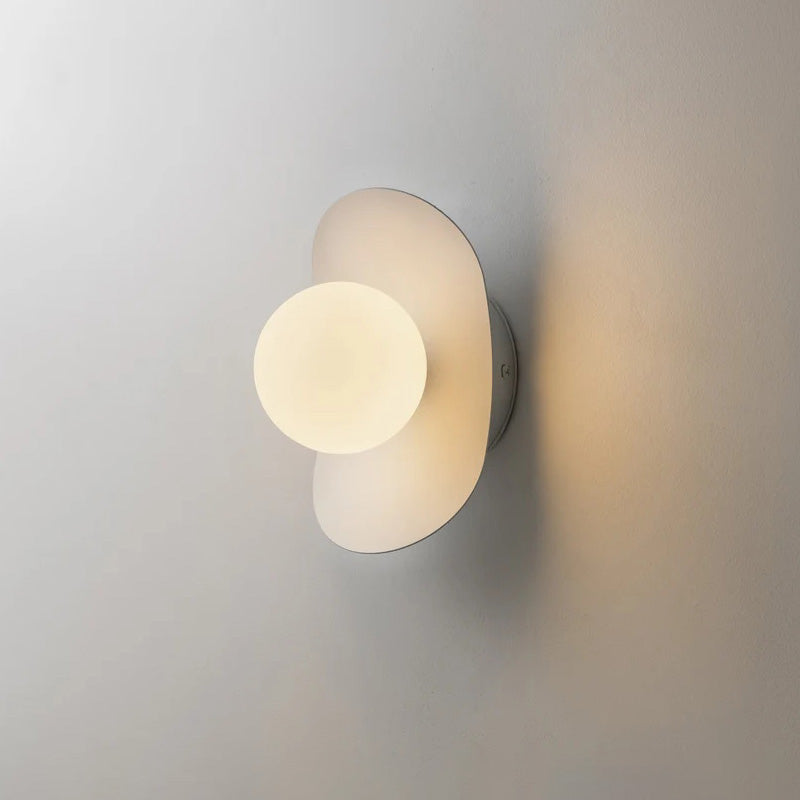 Unlit view of the Nouvel Wall Lamp in polished brass.