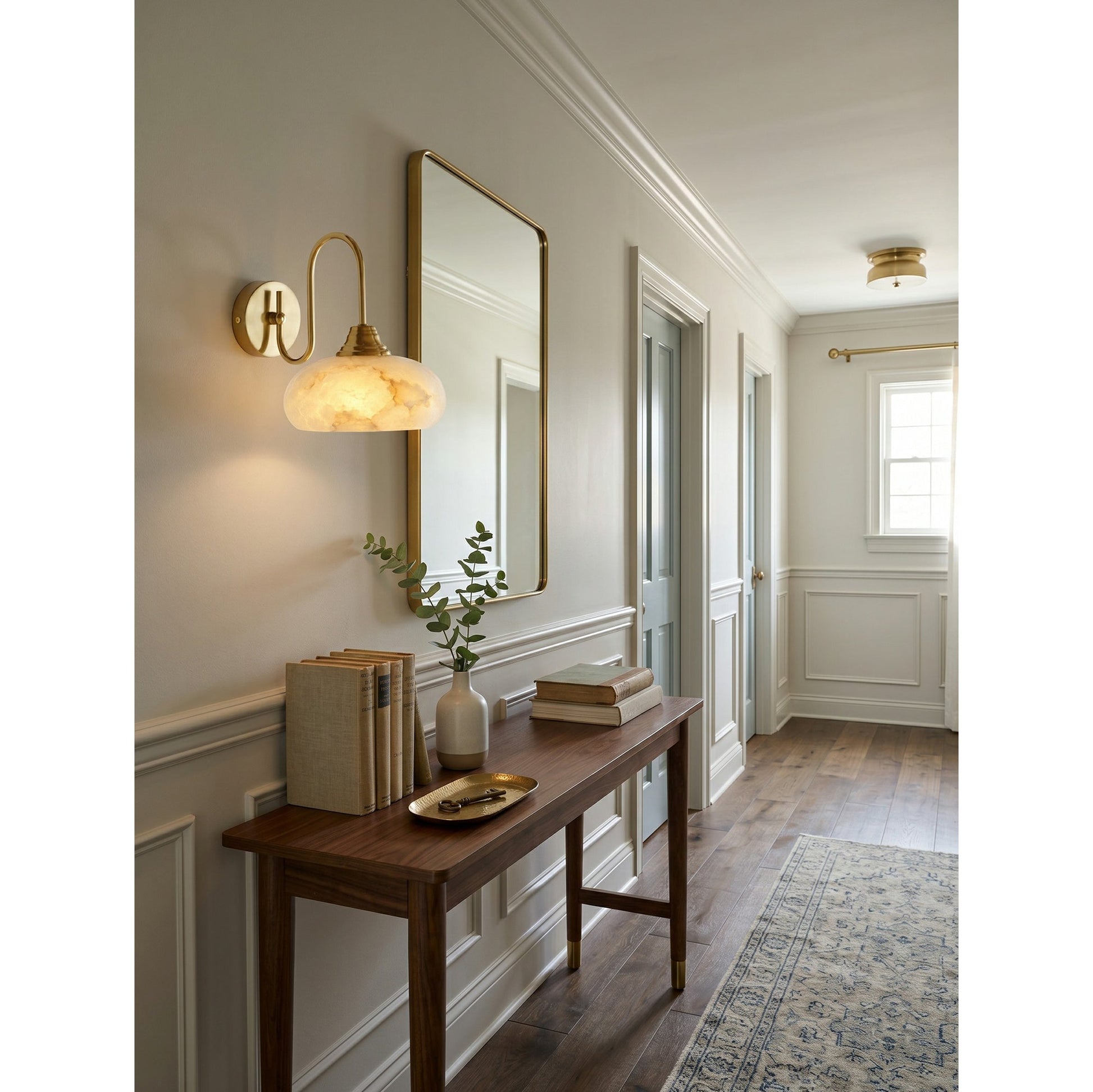 The sconce in a living room, complementing an organic modern decor.