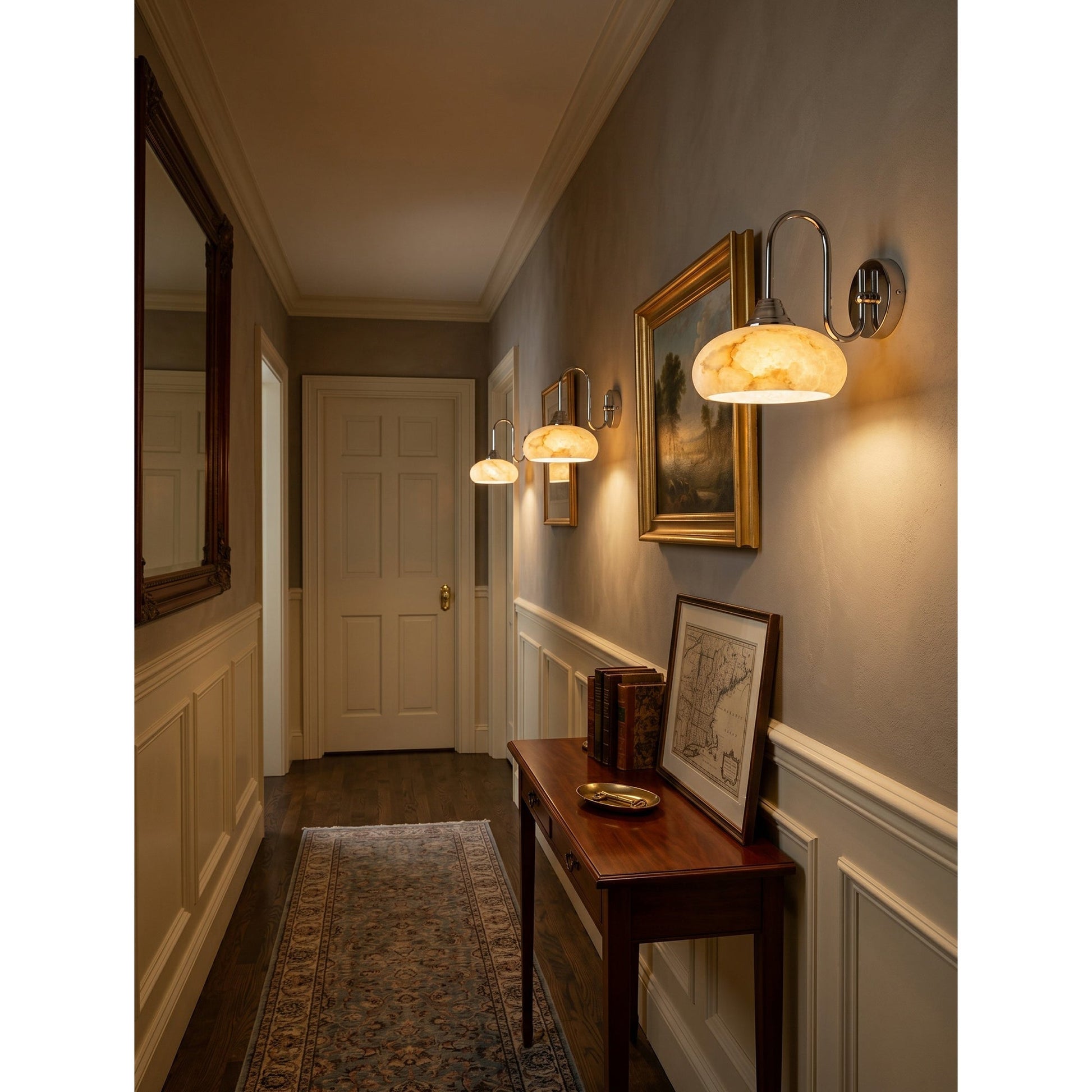 The chrome finish option of the Nova Alabaster Wall Sconce.