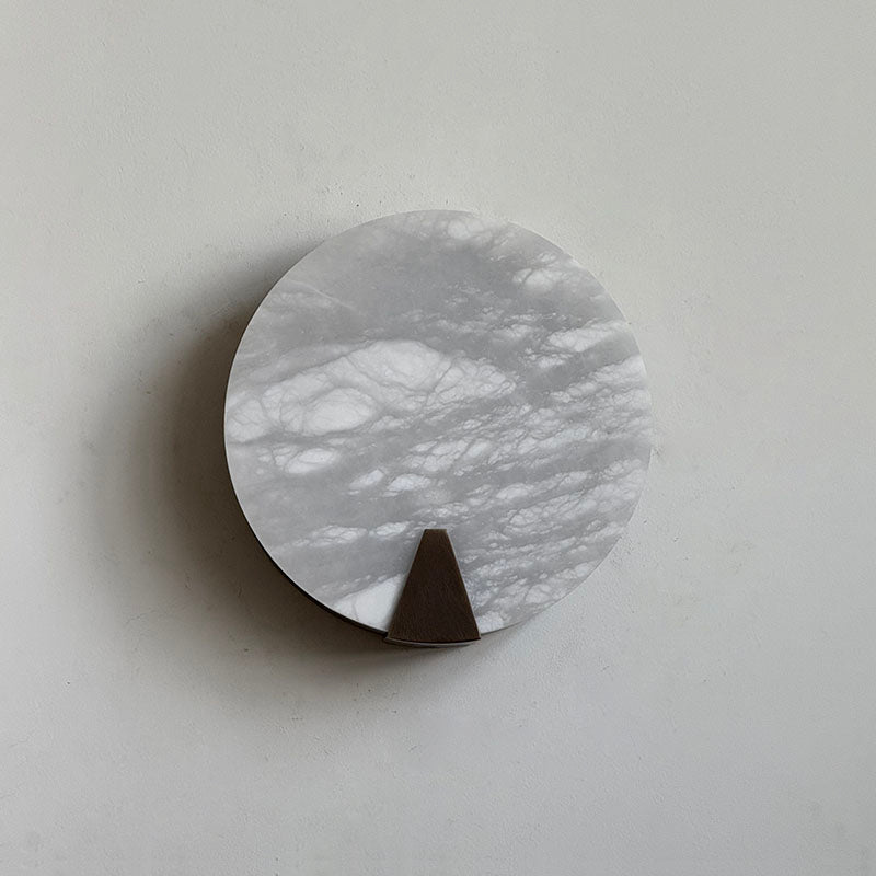 Ophelia Alabaster Sconce unlit, highlighting the stone's texture.