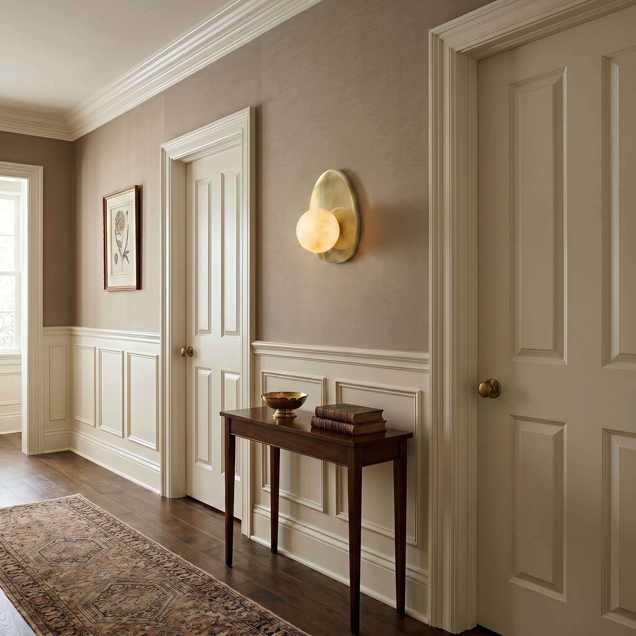 The sconce against a dark wall to showcase its contrast and form.
