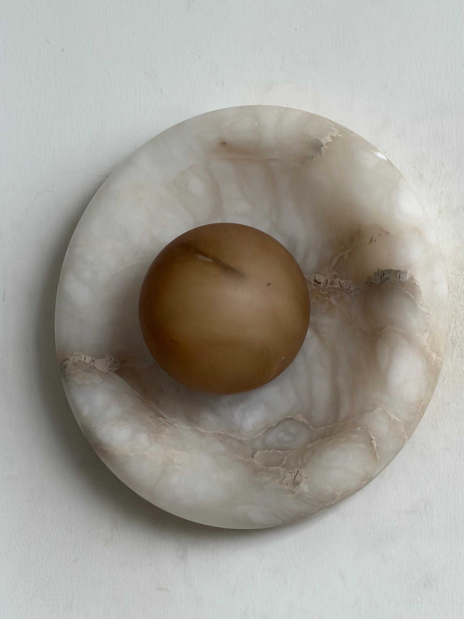 Detail of the G9 socket inside the alabaster fixture.
