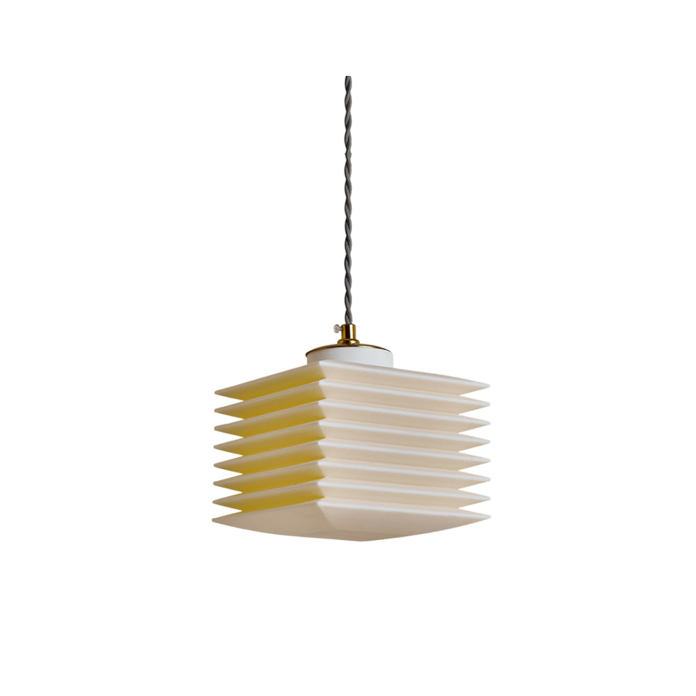 White Pagoda Pendant Lamp in a minimalist dining room.
