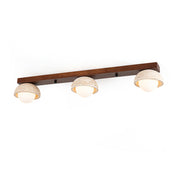 Palermo Combination Ceiling Light with travertine domes on a wooden beam.