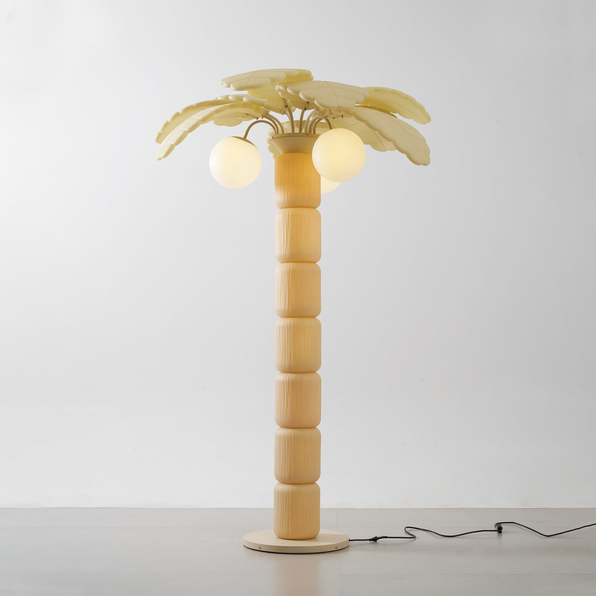 The medium version of the lamp by a poolside.