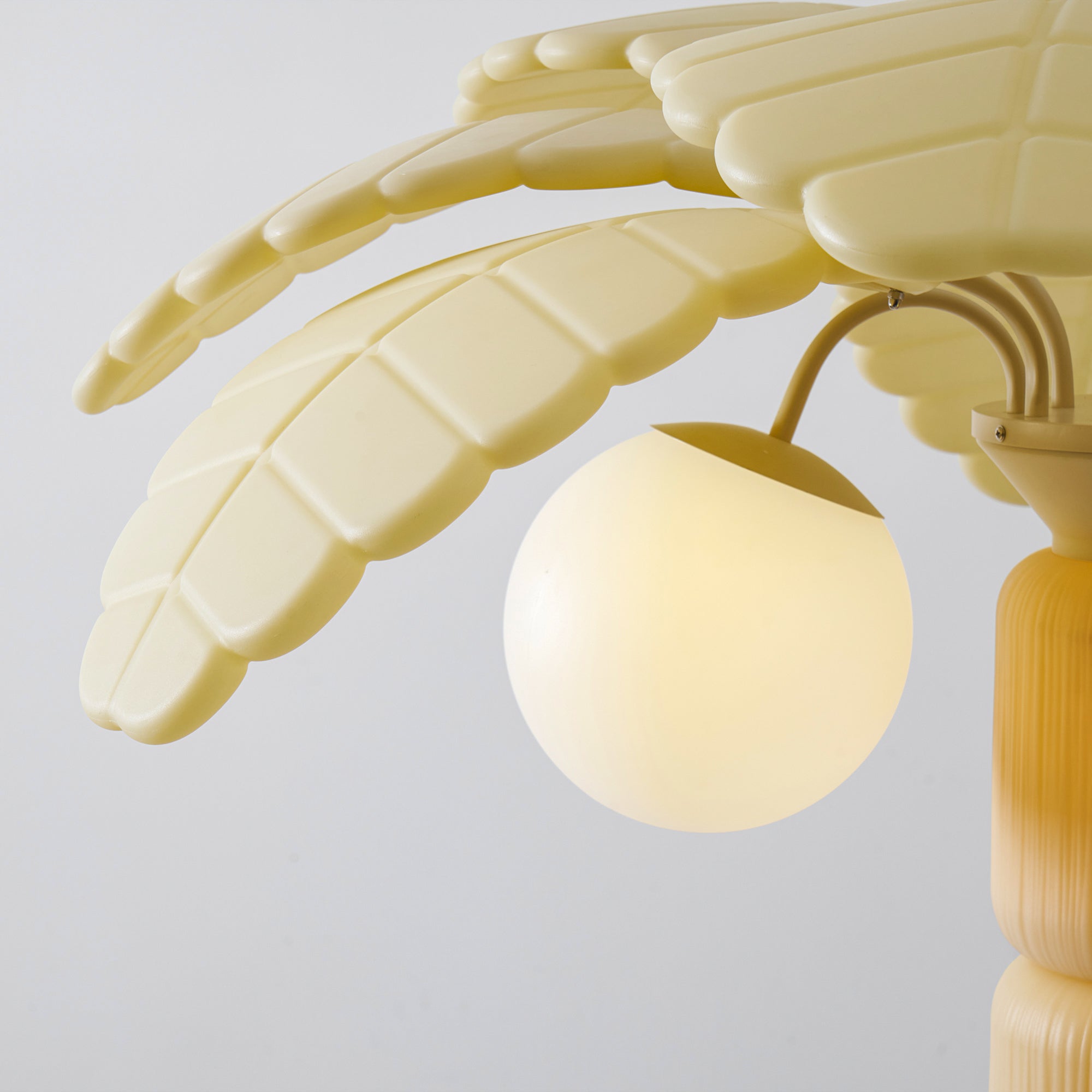 Lifestyle image showing the lamp in a tropical-modern setting.