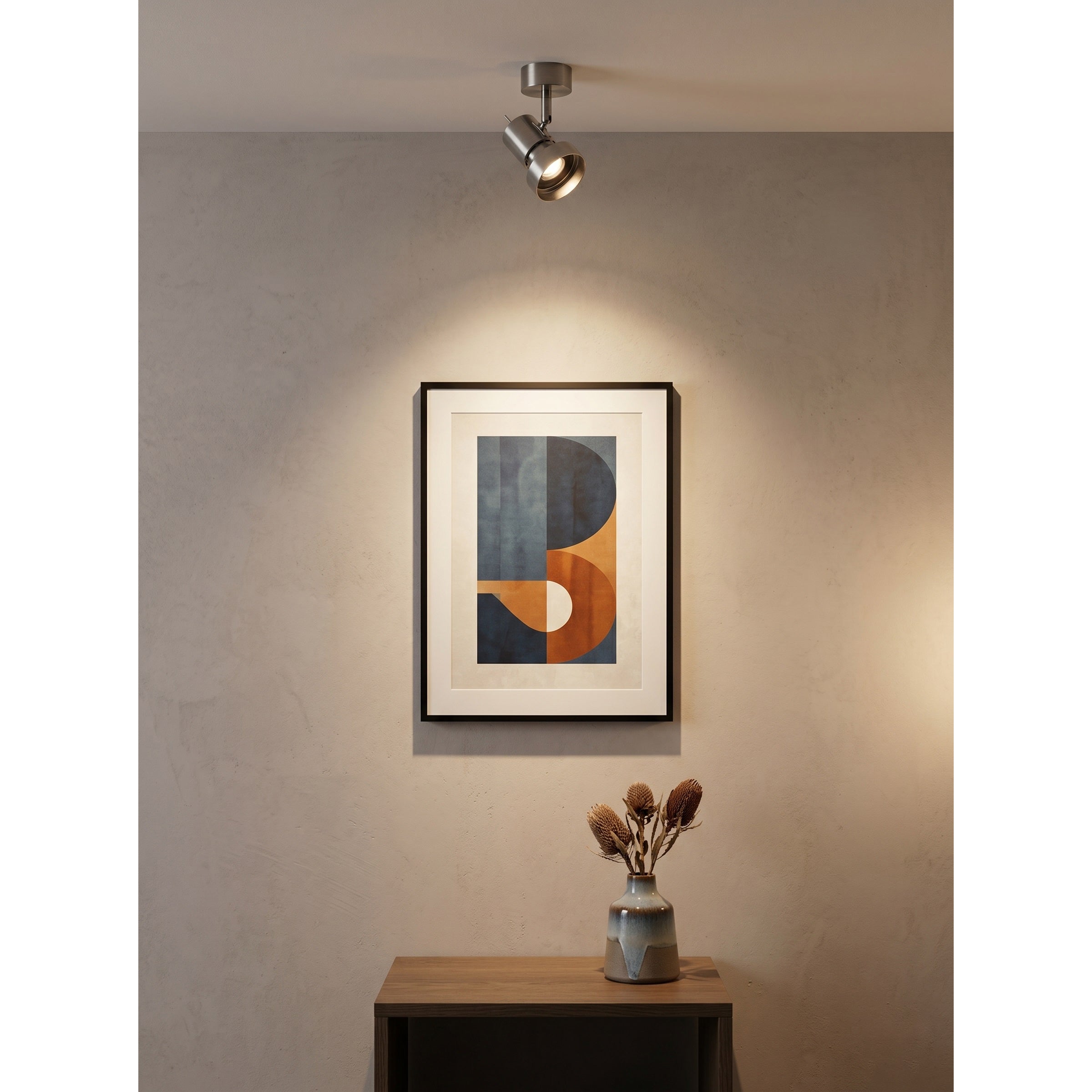 A pair of Palmoni spotlights illuminating a modern hallway.