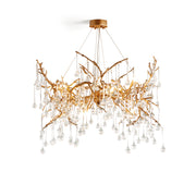 Palwa Chandelier with brass branches and glass droplets, viewed from below.
