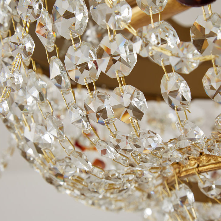 The crystal prisms reflecting light from multiple angles.