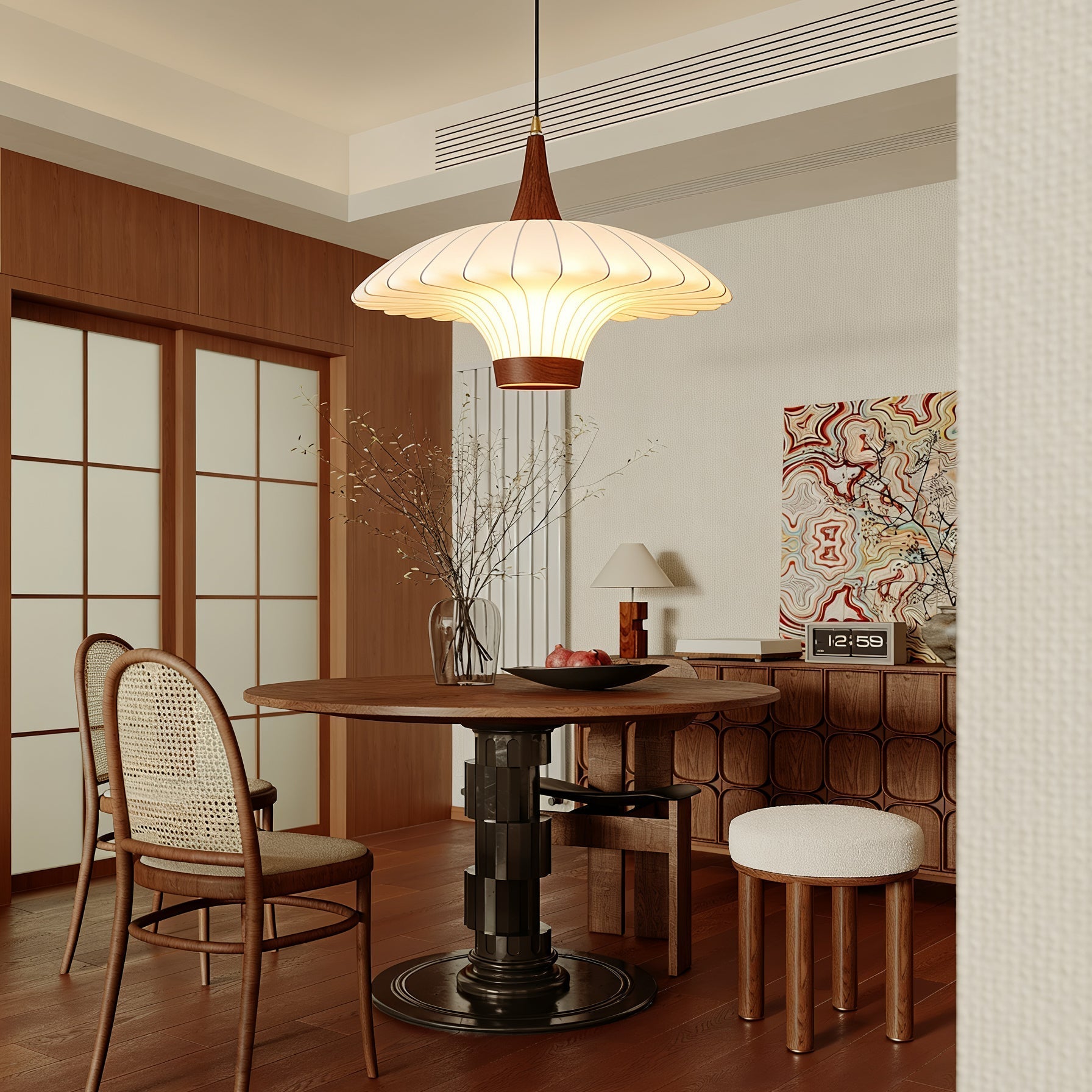 Angled view of the Parasol Pendant Light highlighting its sculptural form.
