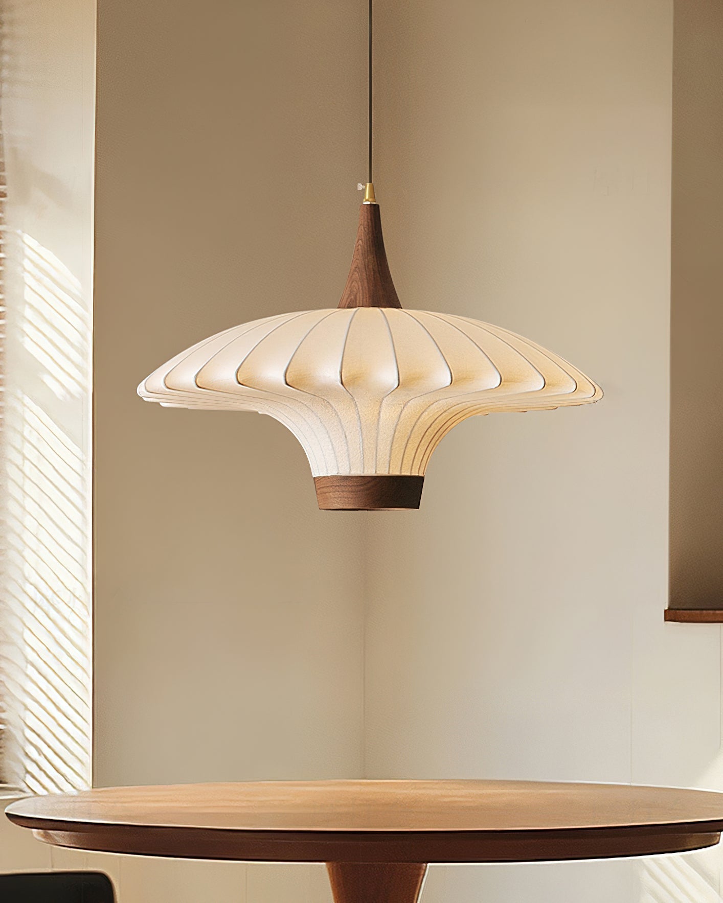 Parasol Pendant Light shown in a modern dining room setting.