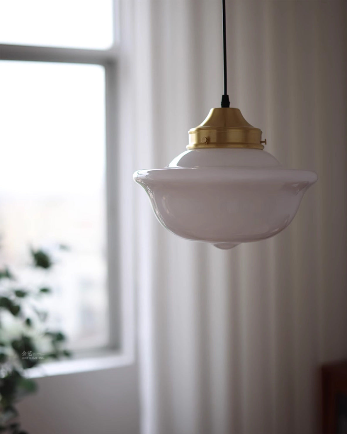 Detail shot of the smooth white glass shade.