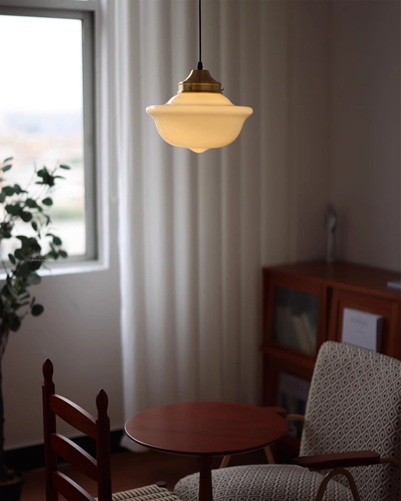 Side view of the Pathson Pendant Light showing its simple, elegant shape.