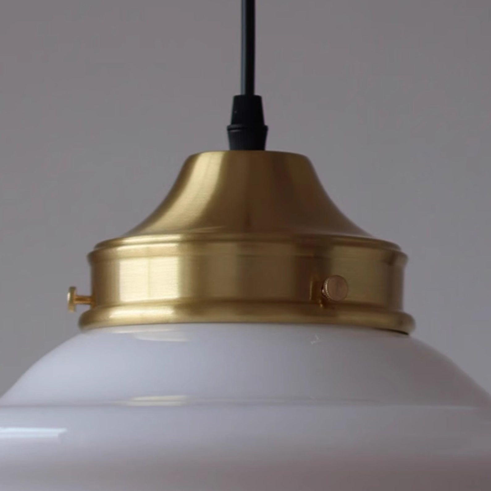 Lifestyle image featuring the Pathson Pendant Light in a dining room.