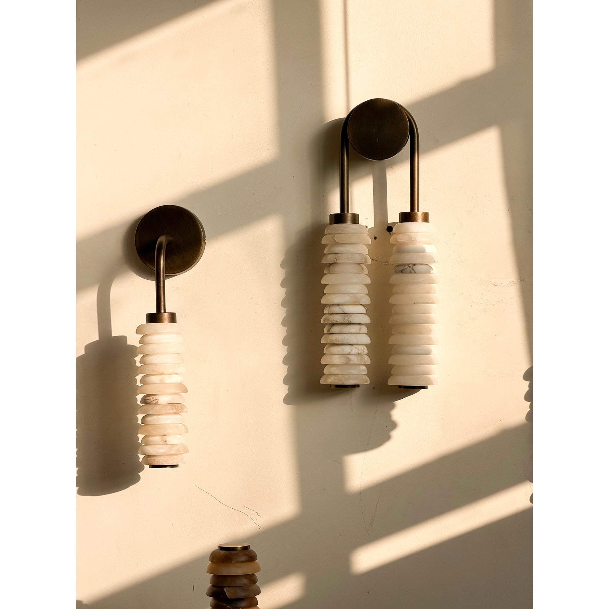 Payson Alabaster Wall Sconce in antique brass finish.