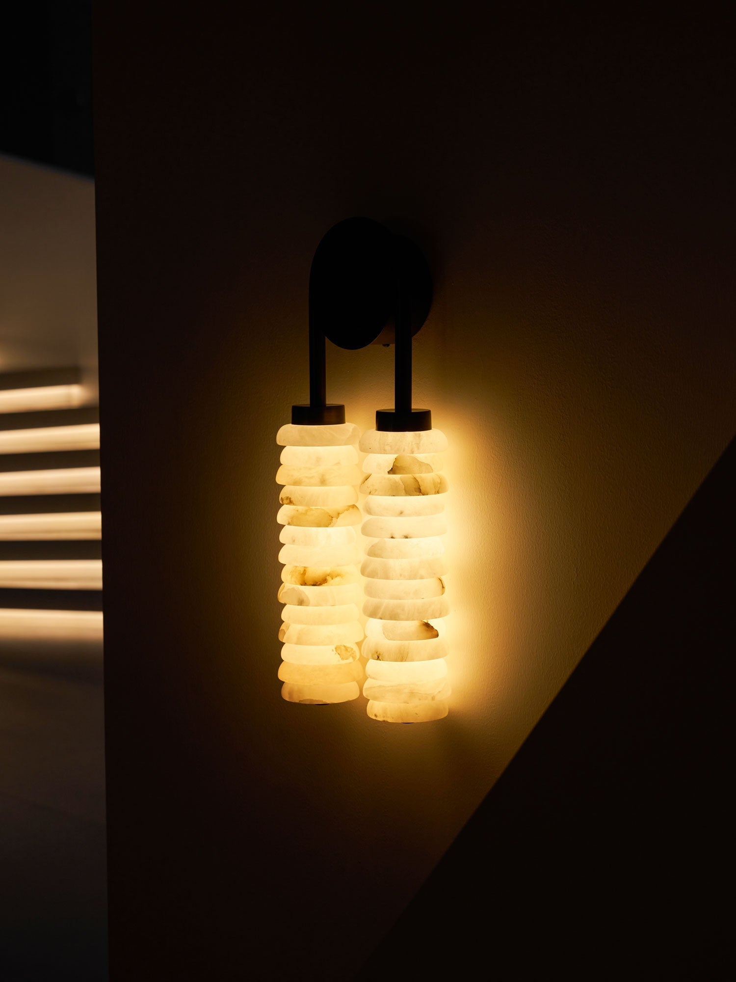 The Payson lamp used as a statement piece in a dining area.