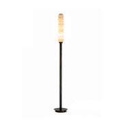 Payson Alabaster Floor Lamp in a minimalist living room.