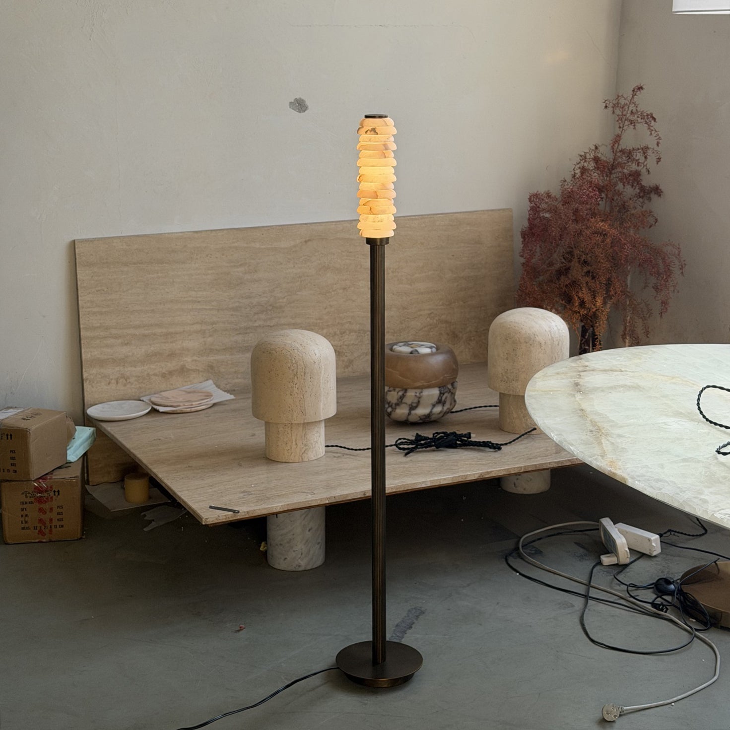 View of the lamp from a low angle, highlighting its height.