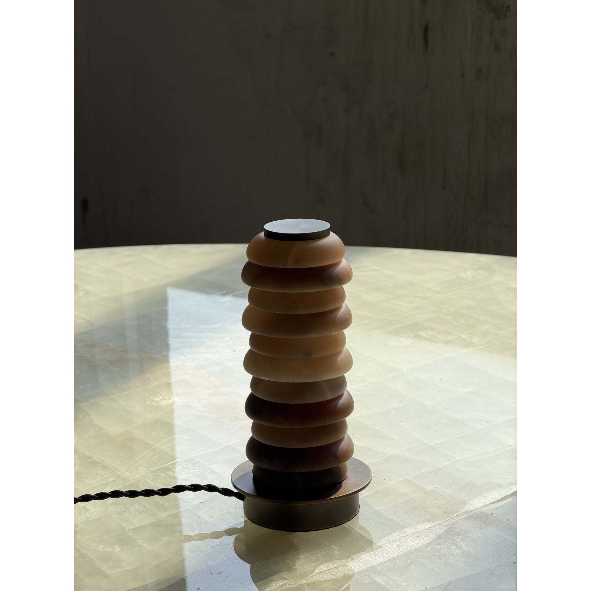 A comparison of the antique brass, white, and brown finishes.