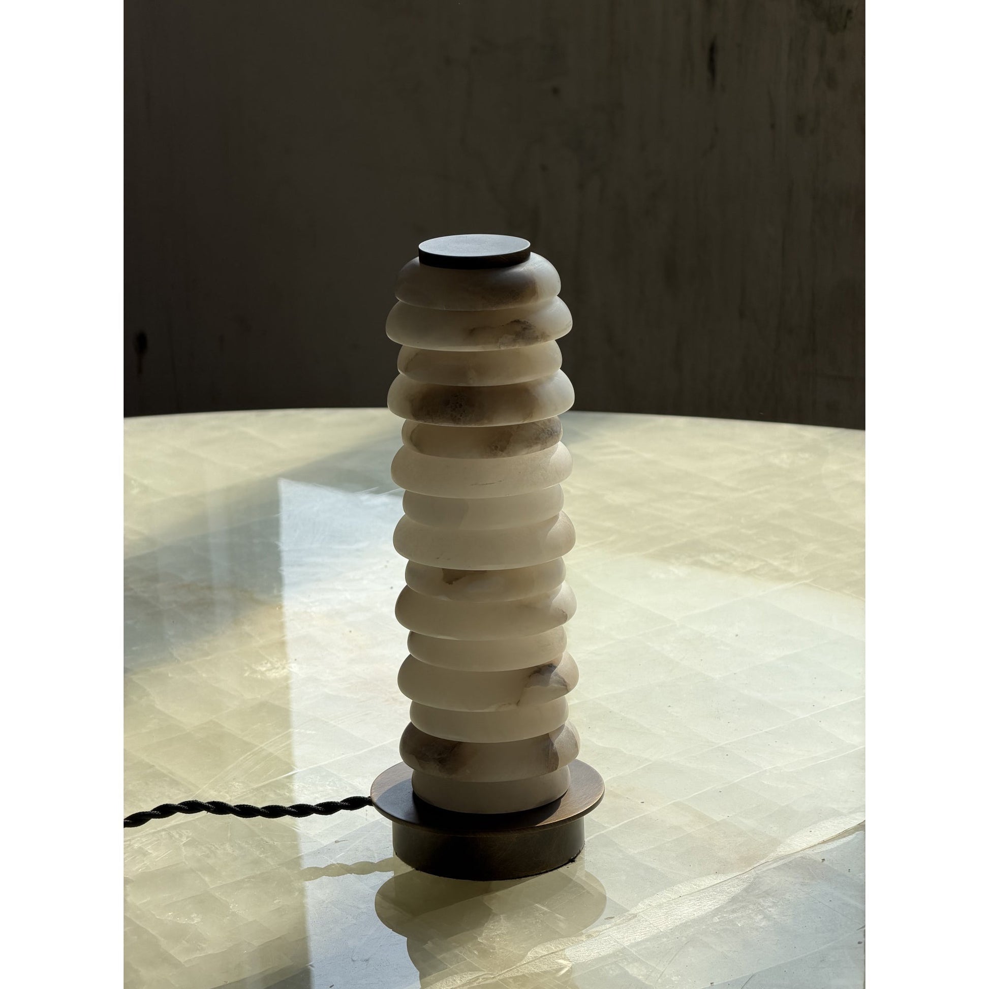 Detail of the 59-inch plug cord and base.