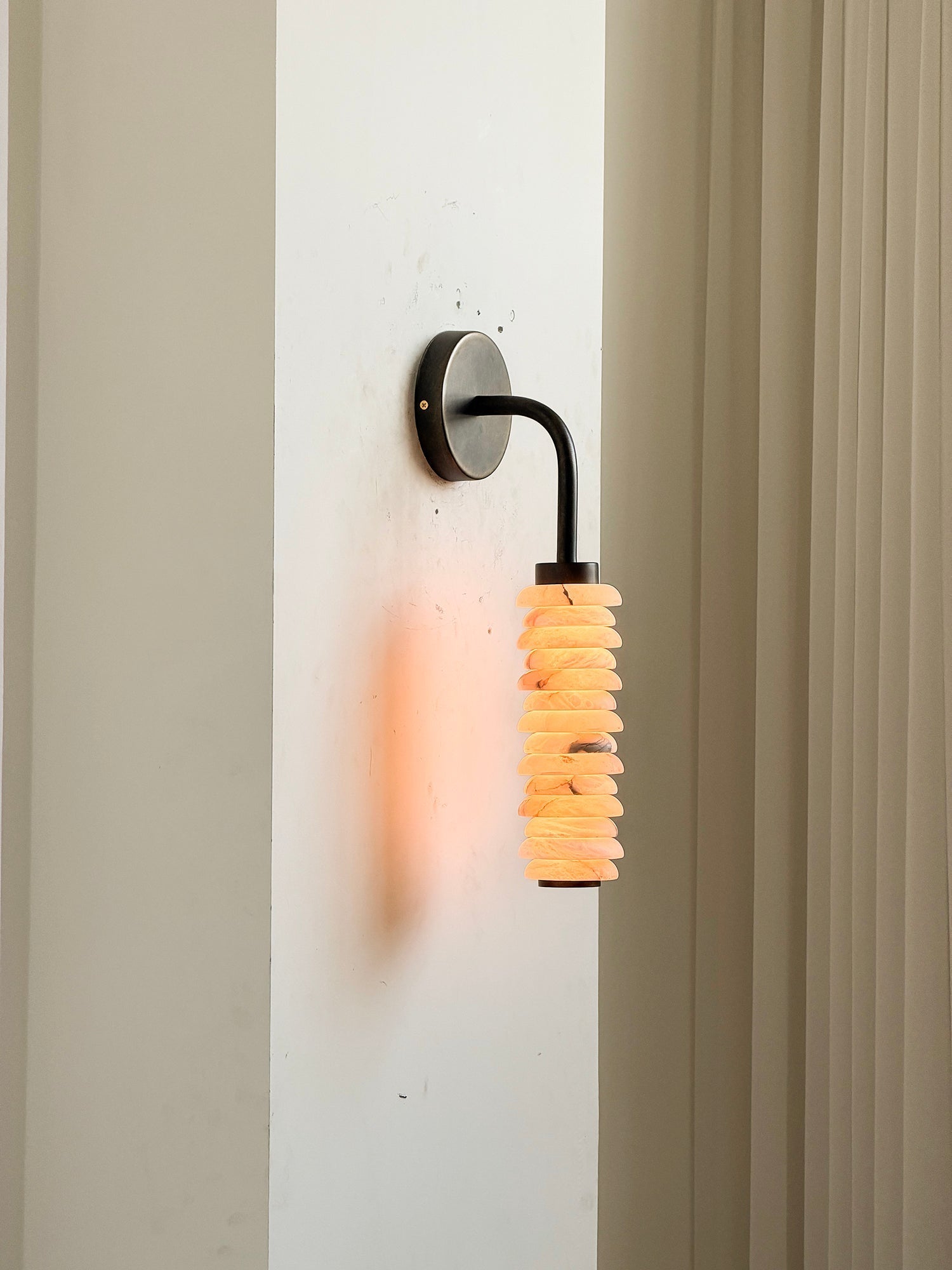 Lifestyle image featuring the Payson sconce in a contemporary home.