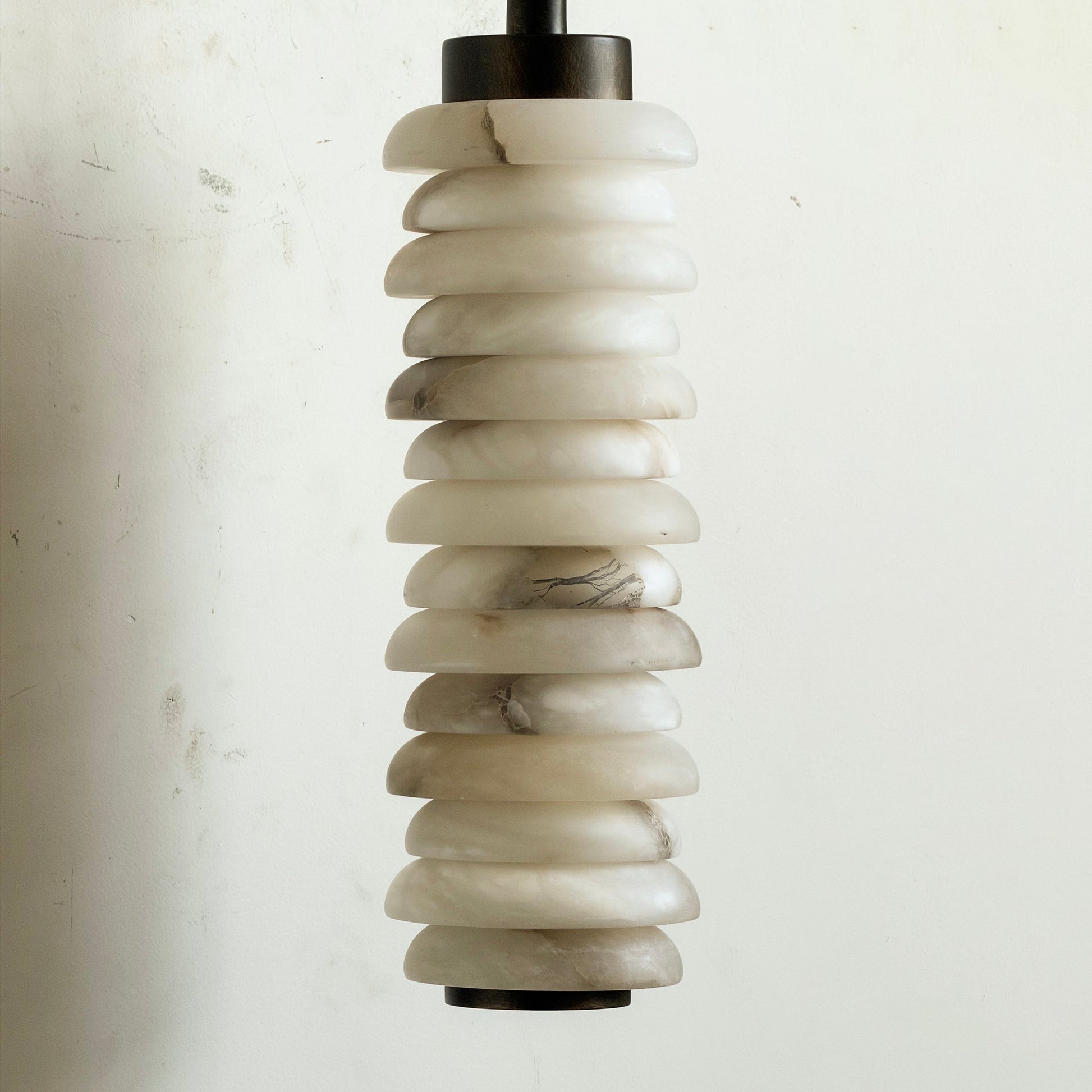 Payson Alabaster Wall Sconce in antique brass, unlit.