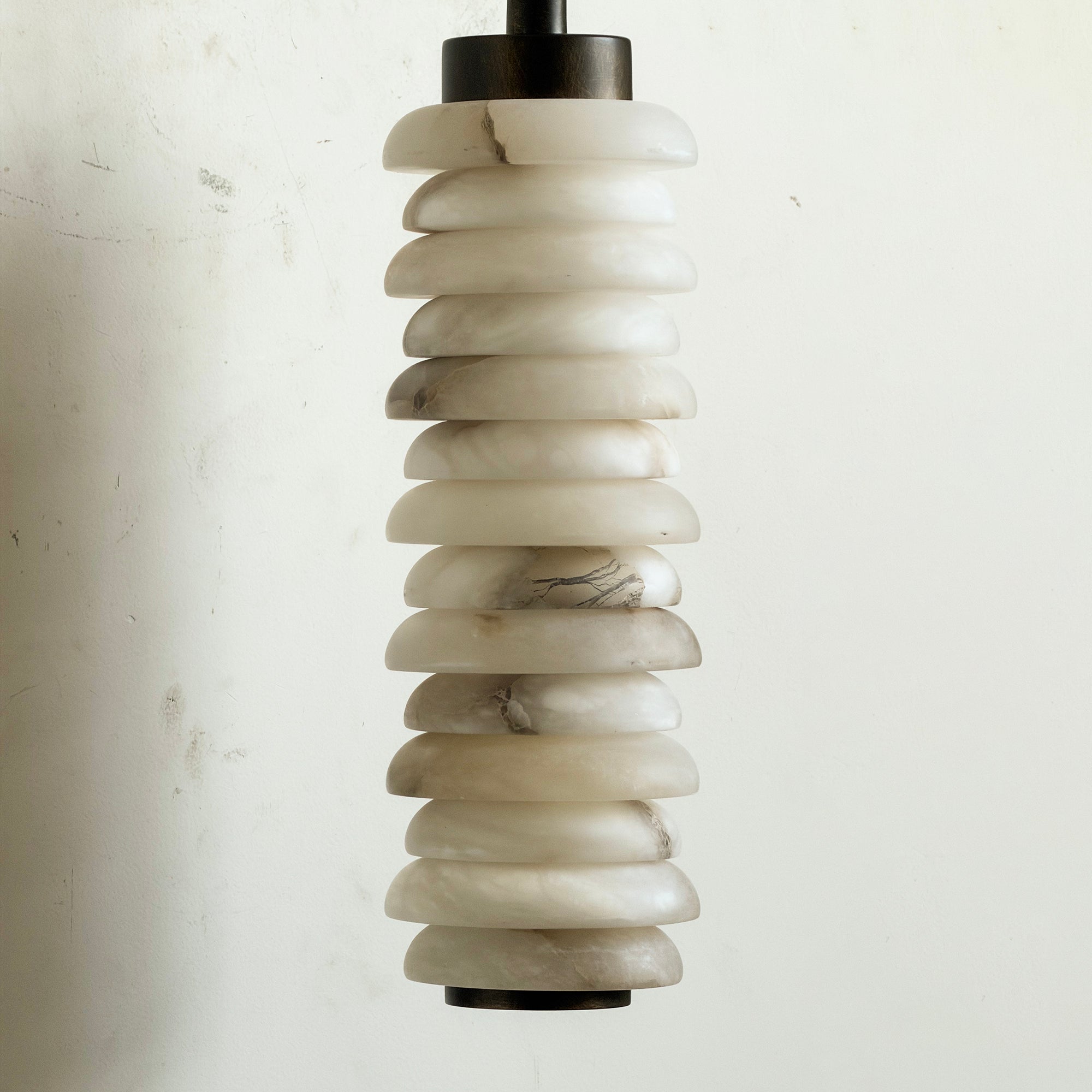 Payson Alabaster Wall Sconce in antique brass, unlit.