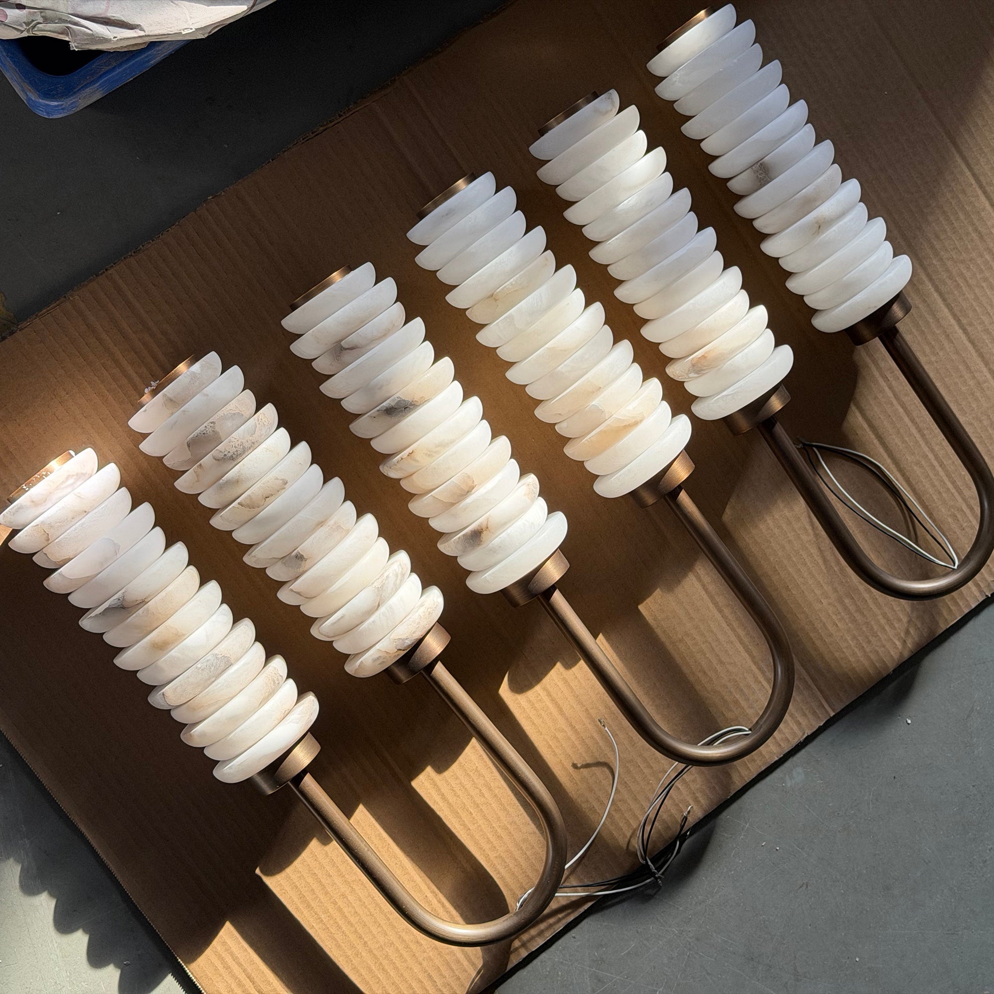 Payson Wall Lamp providing ambient lighting in a dining area.