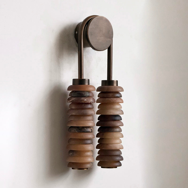 Detail shot of the antique brass fixture and mounting plate.