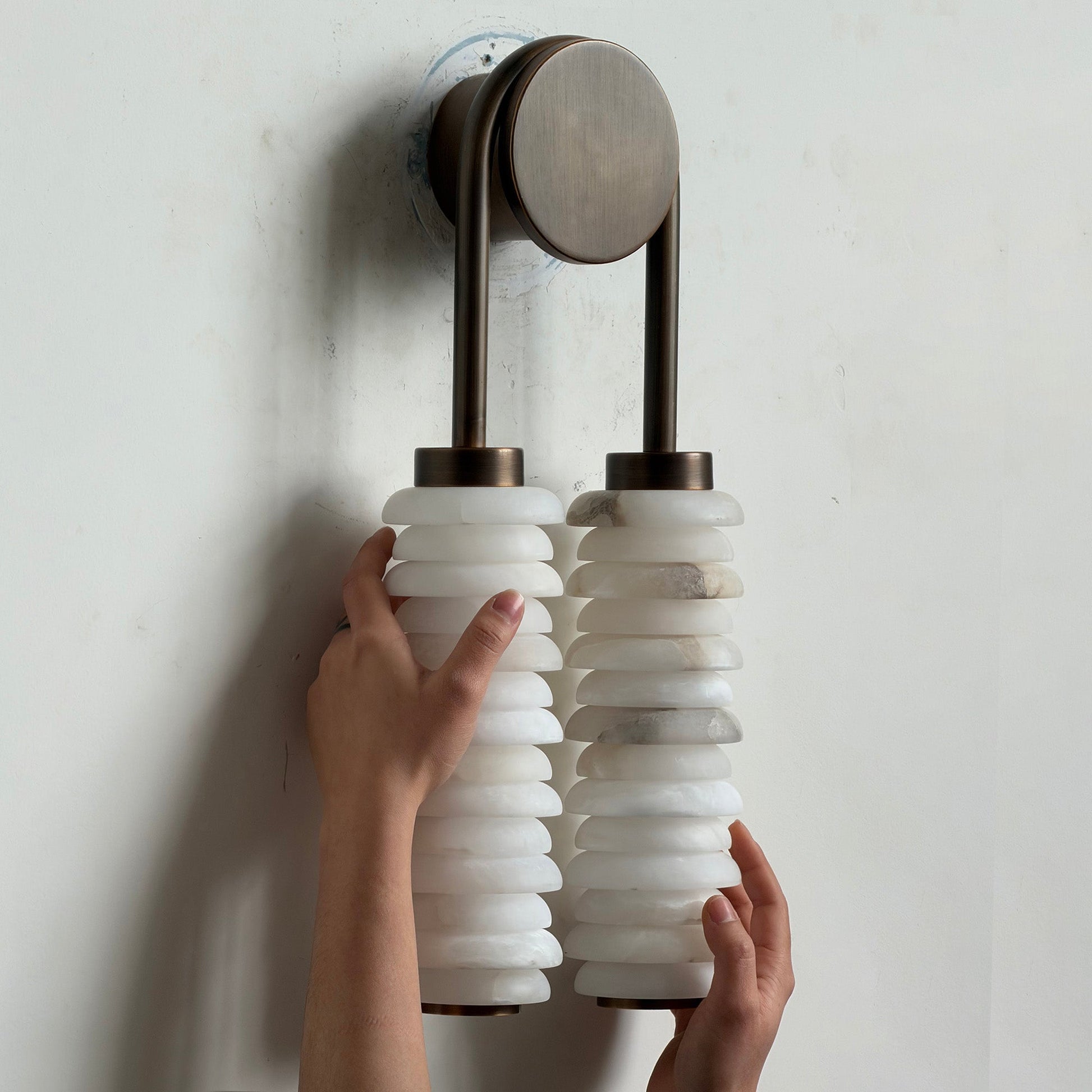 Front view of the Payson Alabaster Wall Lamp showcasing its cylindrical shade.