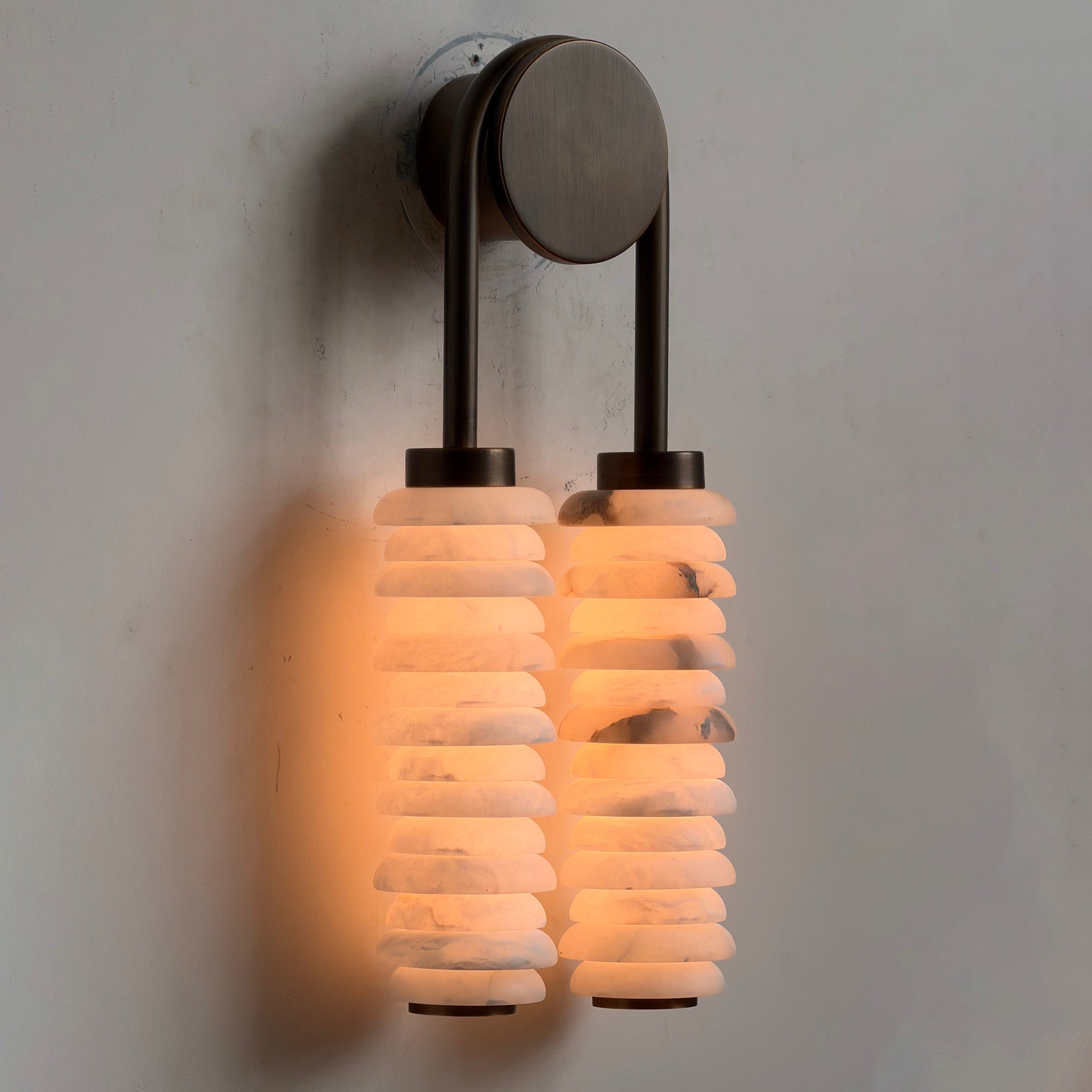 Side view of the Payson Wall Lamp mounted on a wall.