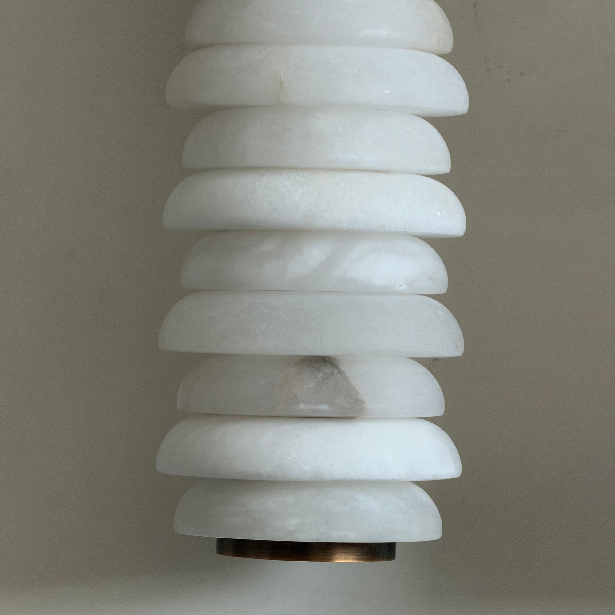 Side view of the Payson Wall Lamp mounted on a wall.