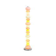 Pebbles Candy Floor Lamp in a modern living room setting.