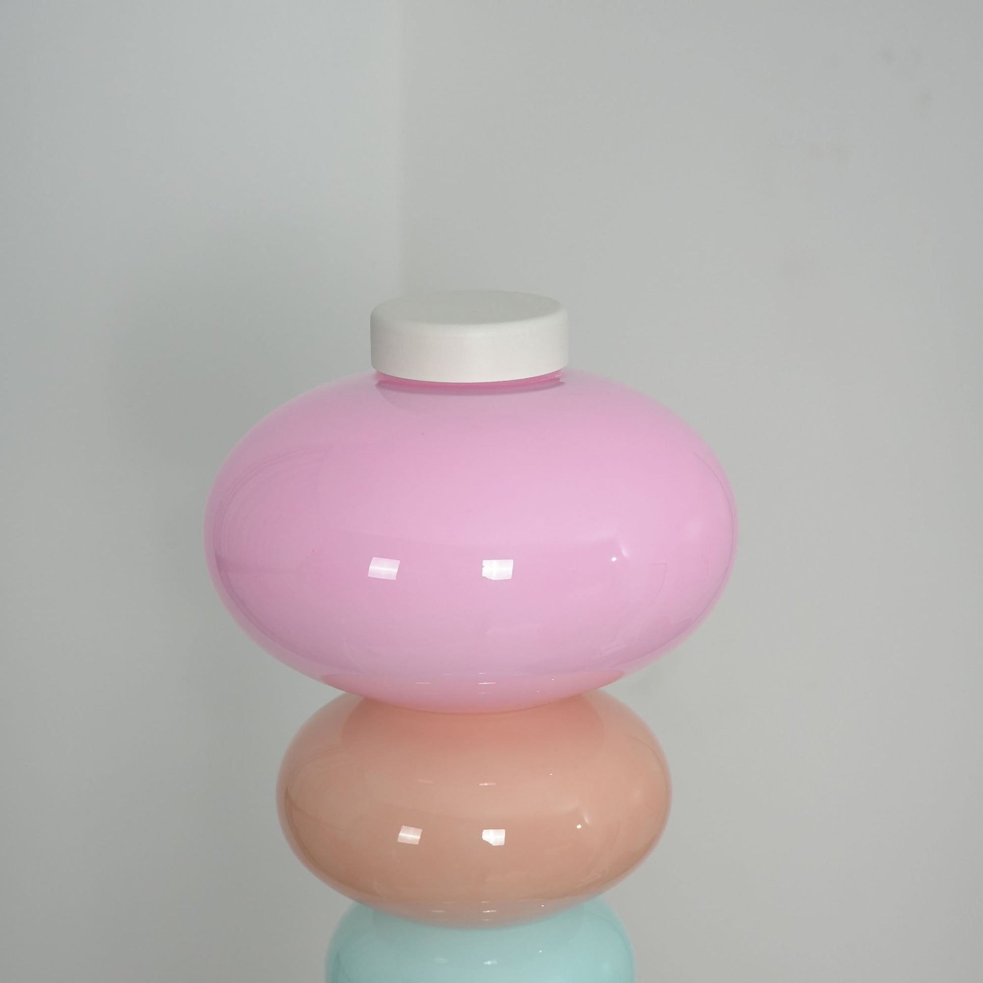 The floor lamp as the primary light source in a dark room.